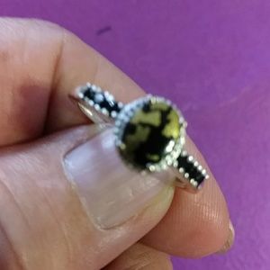 MEN'S UNIQUE GOLDENTINE WITH INDIVIDUALLY FACETED BLACK SPINEL.. RING- SZ. 9
